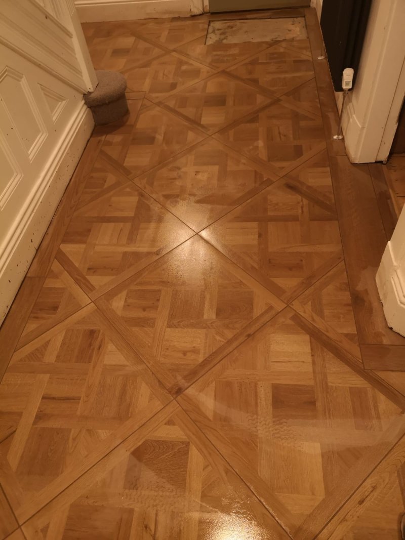 Porcelain hall floor with border and diamond pattern