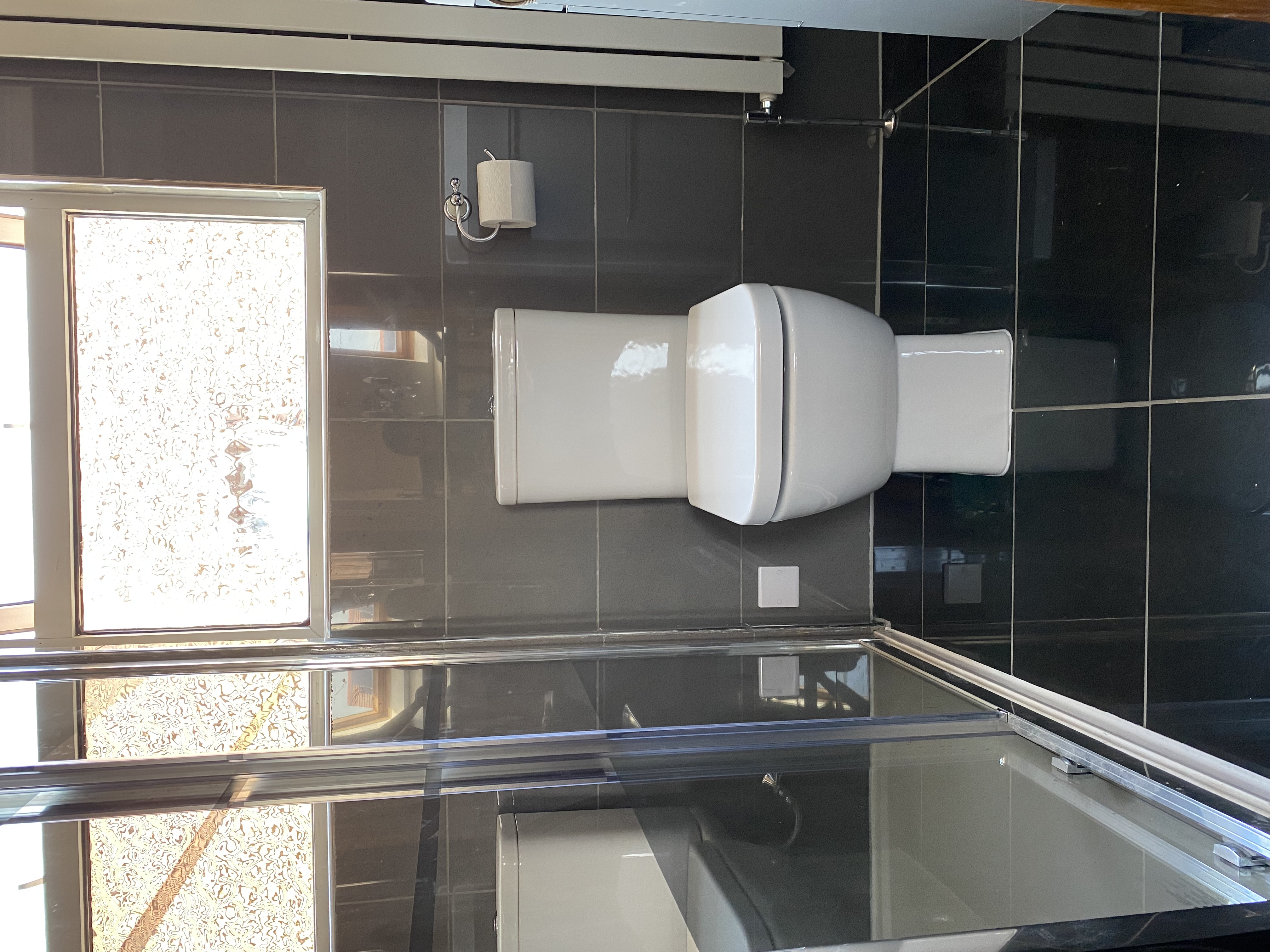 Tiling, plumbing, toilet, shower and basin installation