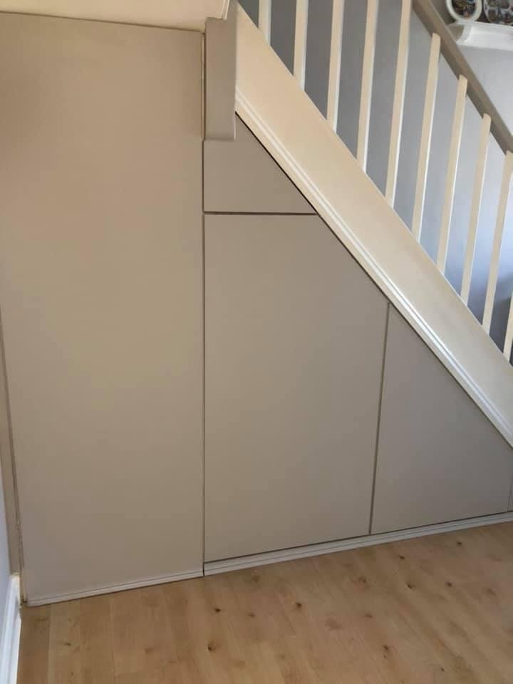 Custom-made under stairs sliding storage